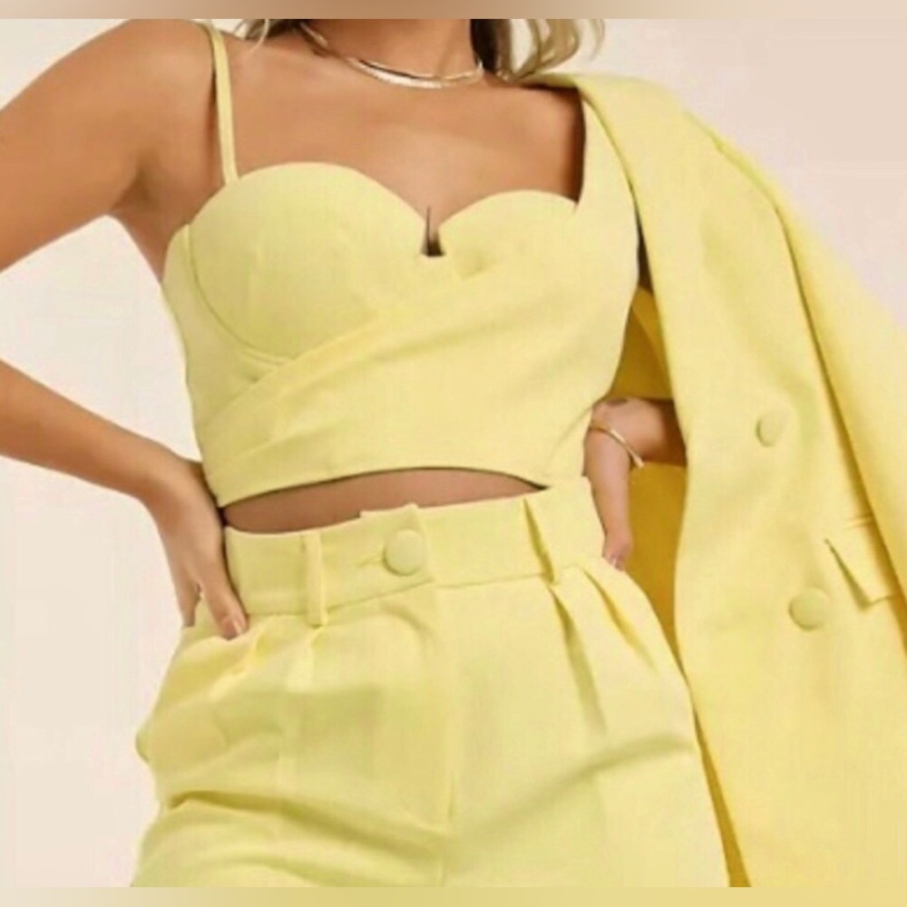 Yellow bustier crop top with padded structured cups, & a rear zipper. NEW Small